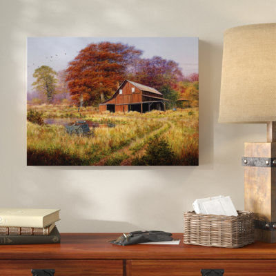« red grange under trees », reproduction de photo sur toile tendue