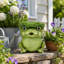 Adorable statuette de grenouille coiffée d'un chapeau en feuille de lotus, figurine décorative animal de dessin animé, sculpture ornementale pour jardin extérieur, porche, pelouse, terrasse, allée.