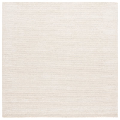 Maynie Hand Tufted Wool/Viscose/Cotton Solid Color Rug in Ivory