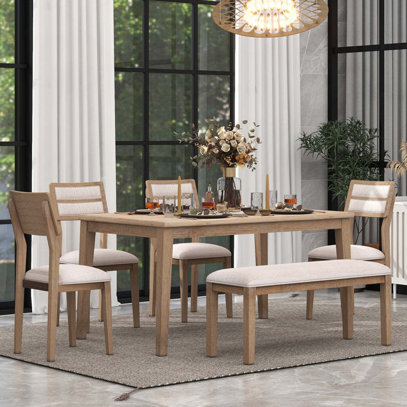 L'ensemble de salle à manger classique et traditionnel 6 pièces, comprend une table de salle à manger, 4 chaises rembourrées et un banc