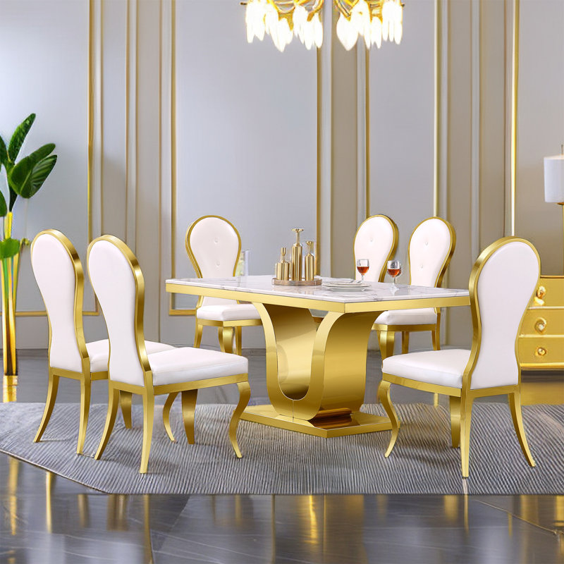 Chaises de salle à manger blanches et dorées