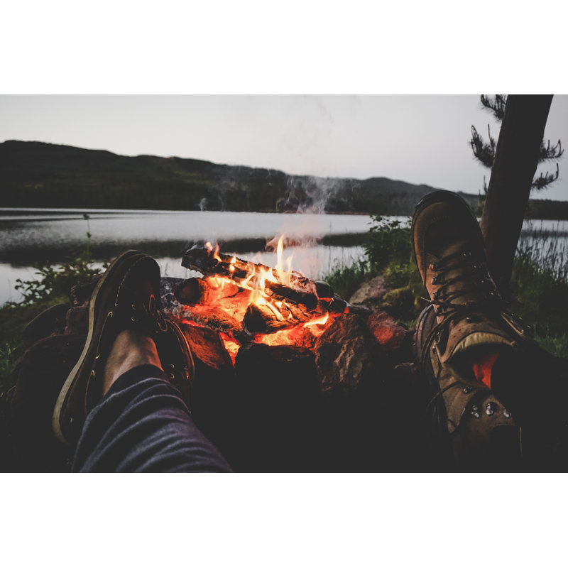 Couple Warming Their Feet On Camp Fire by Maximilian Sarnow - Wrapped Canvas Print, 30cm H x 46cm W x 3.8cm D
