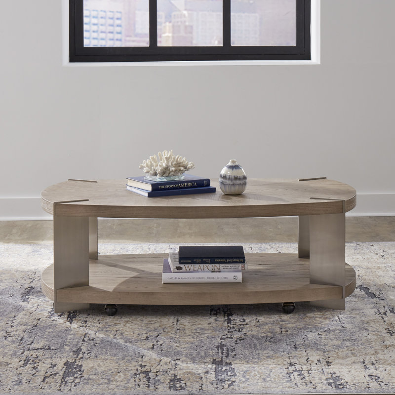 Table basse ovale Euzelia avec pieds et roulettes en métal