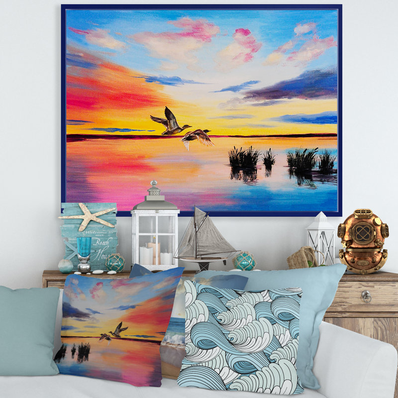 Grues volant pendant un coucher de soleil coloré - peinture sur toile, H 16 po x l 32 po x p 1 po, Cadre flottant bleu