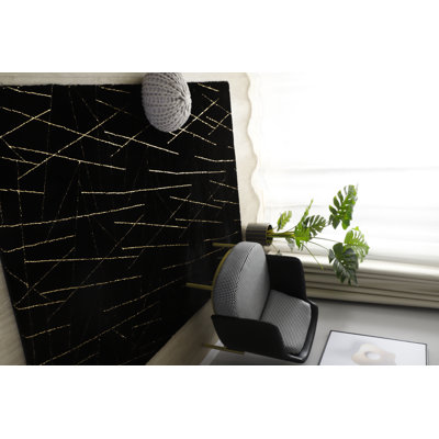 Tapis noir Catignani