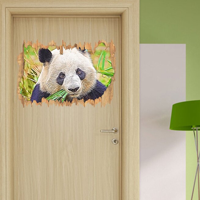 Wandtattoo Kuscheliger Panda frisst schmackhaften Bambus