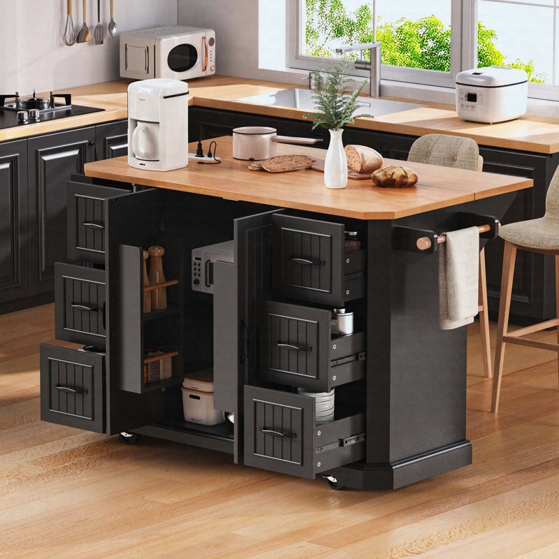 56 inch Kitchen Island with Rubber Wood Veneer Drop Leaf, Power Outlet, 4 Door Shelves, Embossed Vertical Stripe Rolling Kitchen Cart on 4 Wheels with 6 Deep Drawers for Kitchen, Dining Room,Black