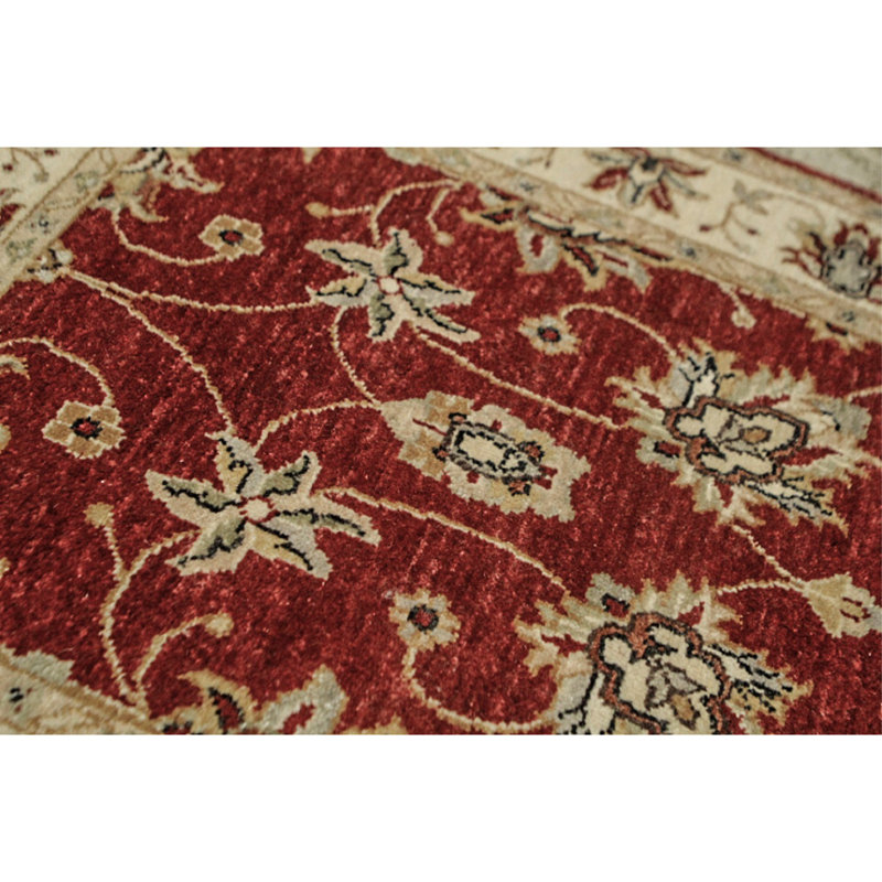 Tapis rouge et ivoire noué à la main de haute qualité