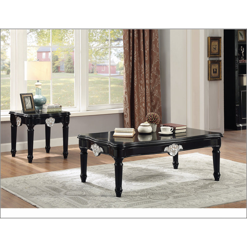 Table basse noire avec pieds tournés