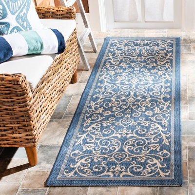 Tapis d'intérieur / extérieur à motif floral Cokley