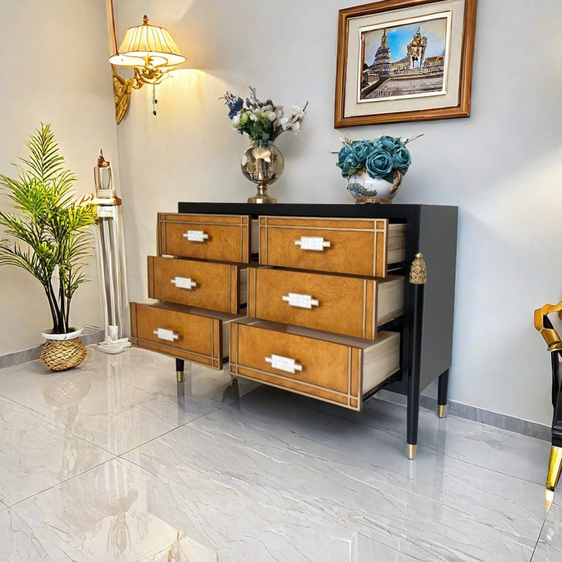 Modern sea shell handle drawer accent cabinet.
