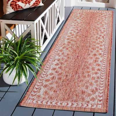 Lomawai Animal Print Power Loom Rust/Beige Indoor/Outdoor Area Rug