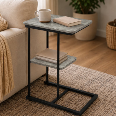 27.21-inch C-shaped side table with a faux-wood tabletop and a steel-frame storage shelf—ideal for living rooms and other spaces