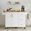Îlot de cuisine blanc avec armoire de rangement, étagère à épices ouverte et comptoir rabattable pliable