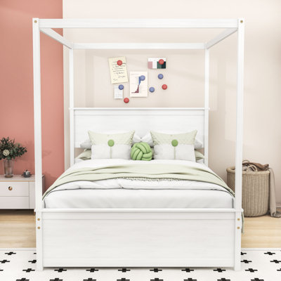 Lit plateforme double à baldaquin en bois avec lit gigogne simple