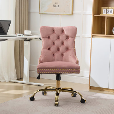 Chaise de bureau rose moderne avec boutons rembourrés en velours, base en métal doré électrolytique, fonction pivotante, coussin à rebond élevé, boutons ajustables à la main, conception à boutons,