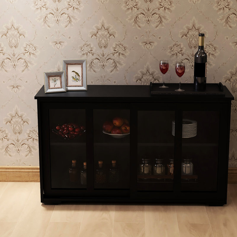 Armoire de cuisine avec porte vitrée - noir. Fabriqué en bois massif pour plus de stabilité. Deux portes coulissantes et des tablettes réglables. Tapis antidérapant sur le dessous. Assemblage sans effort. Peint