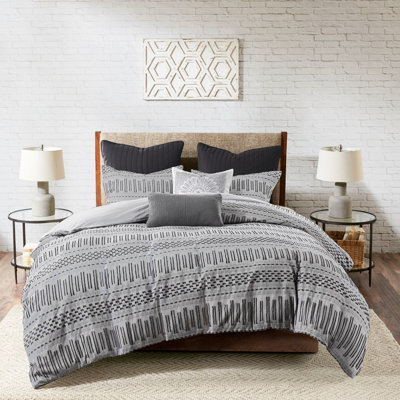 La taie décorative en coton gris / noir ajoute un flair décoratif pour rehausser la qualité de la literie