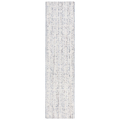 Ebony Hand Tufted Wool Cotton Pet Ikat Rug in Blue/Ivory