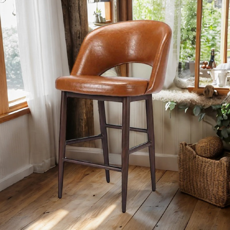Tabouret Xaedyn classique en cuir de style Mid-Century moderne, bien que fabriqué, Tanné