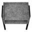 Table d'appoint grise avec bords doux et structure en métal noir pour le rangement robuste de la chambre à coucher