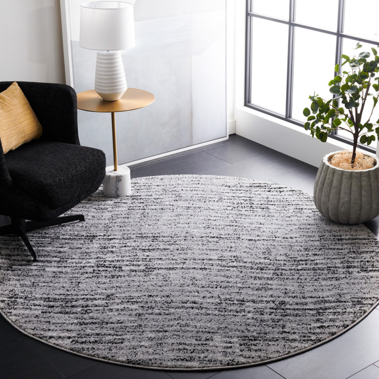 Riebe Abstract Black/Silver Area Rug