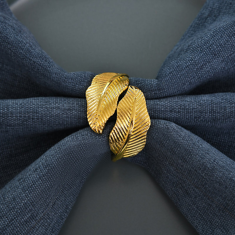 Gold Napkin Rings Set of 4 Stylized Overlapping Leaf Design for Elegant Dining Table Decor