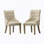 Ensemble de deux fauteuils à oreilles capitonnés en bois massif brun clair avec têtes de clous, pour un siège confortable et élégant-981012996