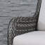 Chaise berçante en osier avec coussins Schutt-925171962