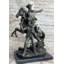 Statue de bronze d'un cowboy de l'Ouest