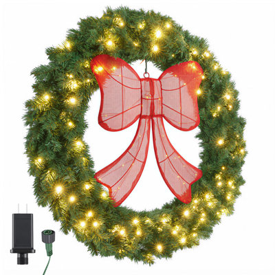 Couronne de Noël à DEL avec grand nœud rouge