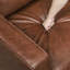 Causeuse transitionnelle en similicuir chocolat avec accoudoirs et passepoil pour un décor rustique - Style Modern Living Espaces