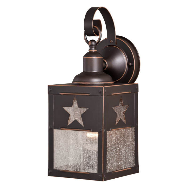 Vandervoort 13 in. H 1-Light Burnished Bronze Rustic Star Outdoor Wall Sconce made of Durable Steel, Clear Seeded Glass Shade, LED Compatible, Use for Exterior Porch Patio Front Door or Garage