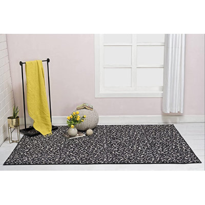 Tapis noir / gris à imprimé animal