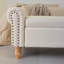 Banc de rangement rembourré avec accoudoirs roulés