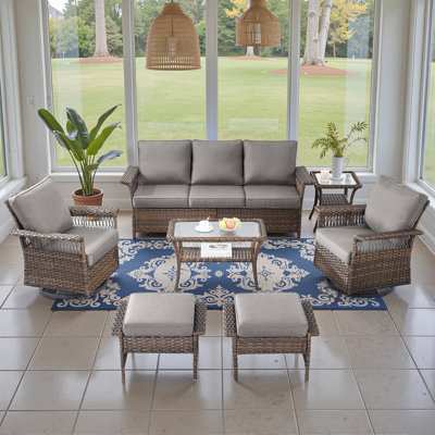 Ensemble de mobilier d'extérieur en osier 7 pièces avec fauteuil coulissant, table d'appoint et repose-pieds Anferney