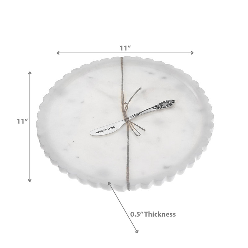 Assiette et épandeur en marbre blanc festonné