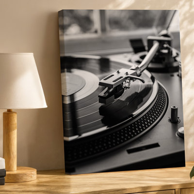 Canvas A Close Up Shot Of A Vintage Turntable With A Wall Art Shiny Black Vinyl Record Spinning Captured In Soft Diffused Natural Canvas Wall Art