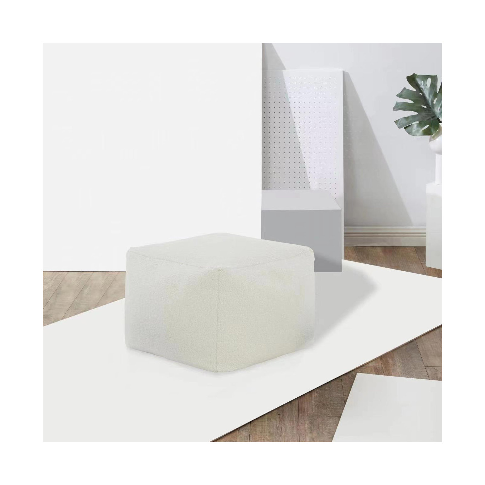 Inaki Upholstered Pouf, White Faux Lams Wool