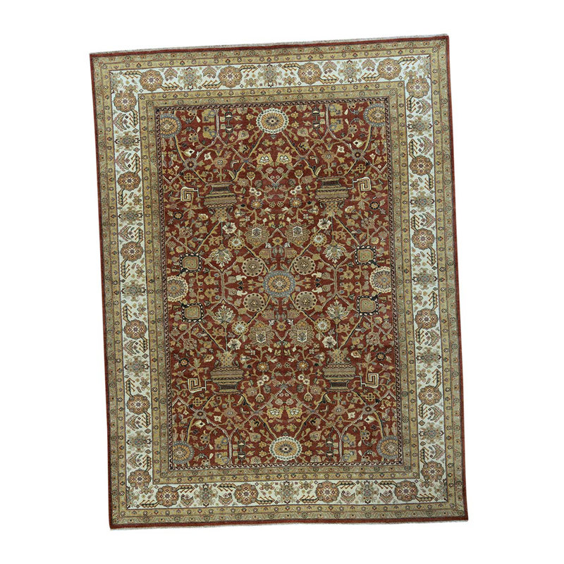 Tapis rouge / ivoire noué à la main