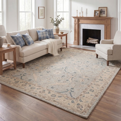 Tapis traditionnel en laine fait main Lilia, bordé de bleu et de crème