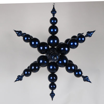  39" Blue Candy Starburst Finial. This large ornament features a stunning candy apple finish. It measures 39 inches tall.