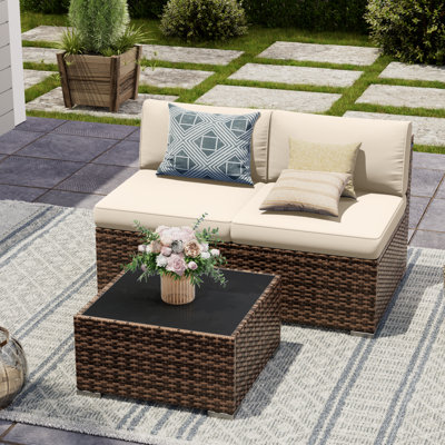2 Piece Rattan Sectional Seating Group With Table