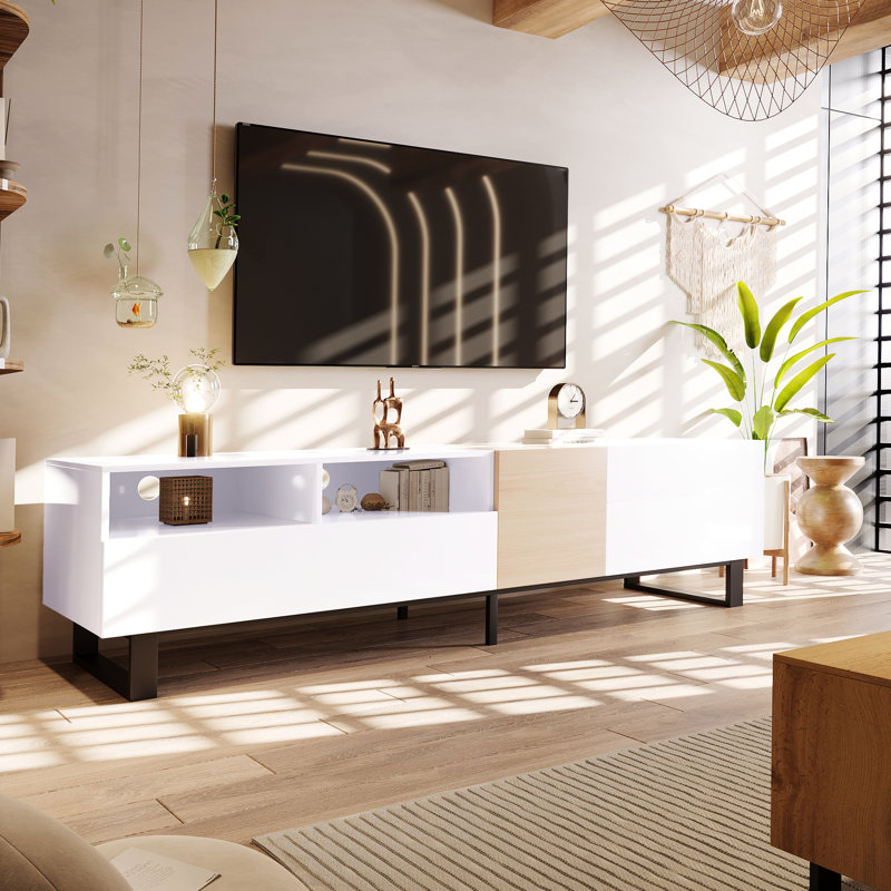 Meuble télé moderne pour téléviseur 80 po, blanc avec meuble polyvalent et porte de chambre rabattable, double rangement, console média, portes pour la maison