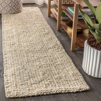 Tapis ivoire clair en jute tissé à la main Pata