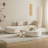 110 " luxurious curved modular sofa with a left armrest, upholstered in fabric material, suitable for use in living rooms and apartments, in the white cream style."-334229339-334229338