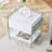 Bedside table with drawers. The board surface is MDF with white grain sticker, and both sides are transparent tempered glass. The design is simple and elegant, with excellent storage functions.