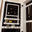 Armoire à bijoux murale avec miroir Ellett