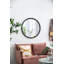 Miroir circulaire avec cadre perlé en métal pour le salon