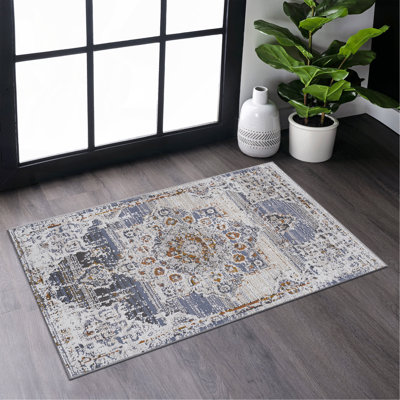 Tapis crème / or / médaillon